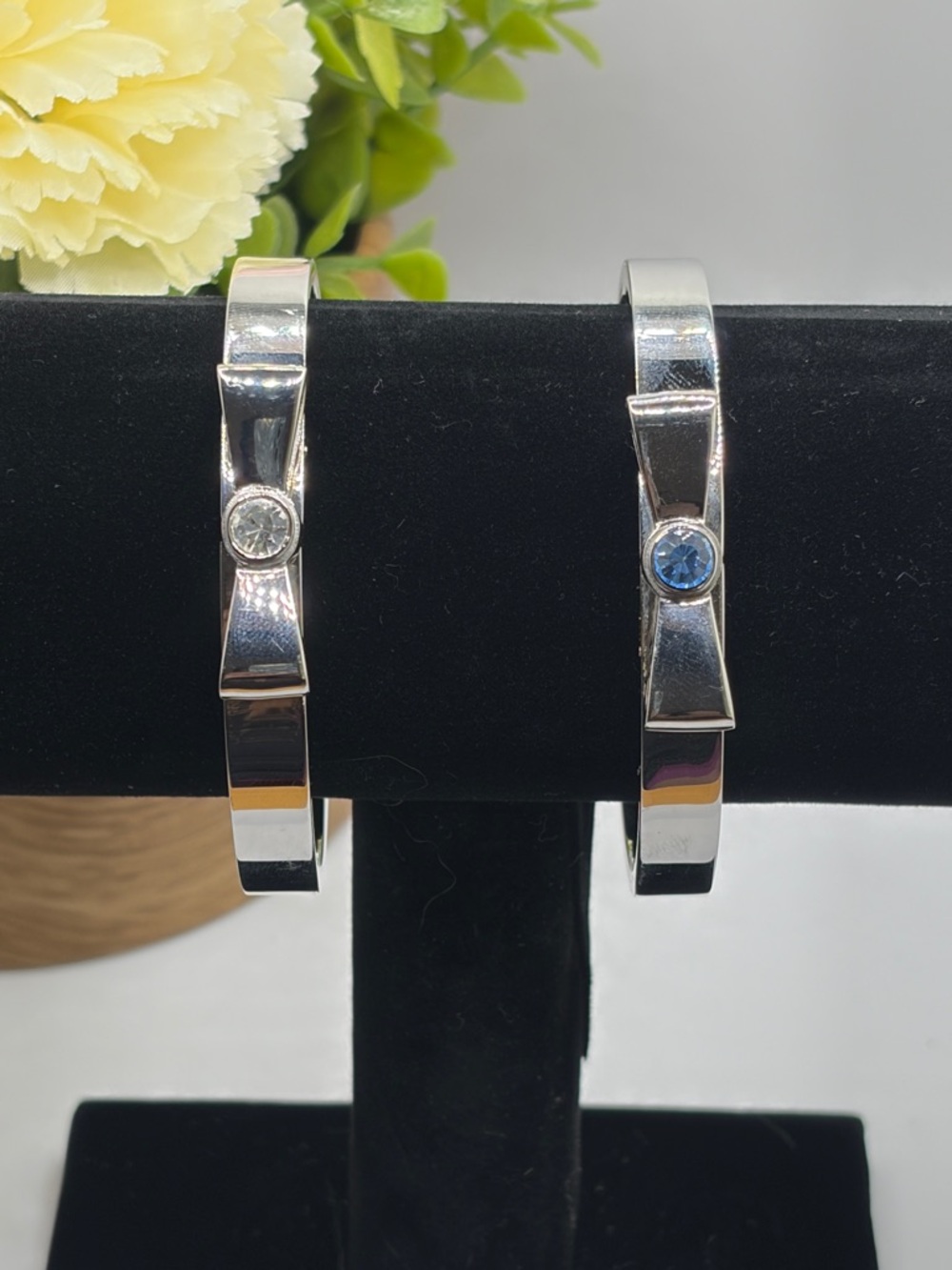 JCM Stainless Steel Silver Tone Hinged Bangle Bracelets w/ Bow Accent